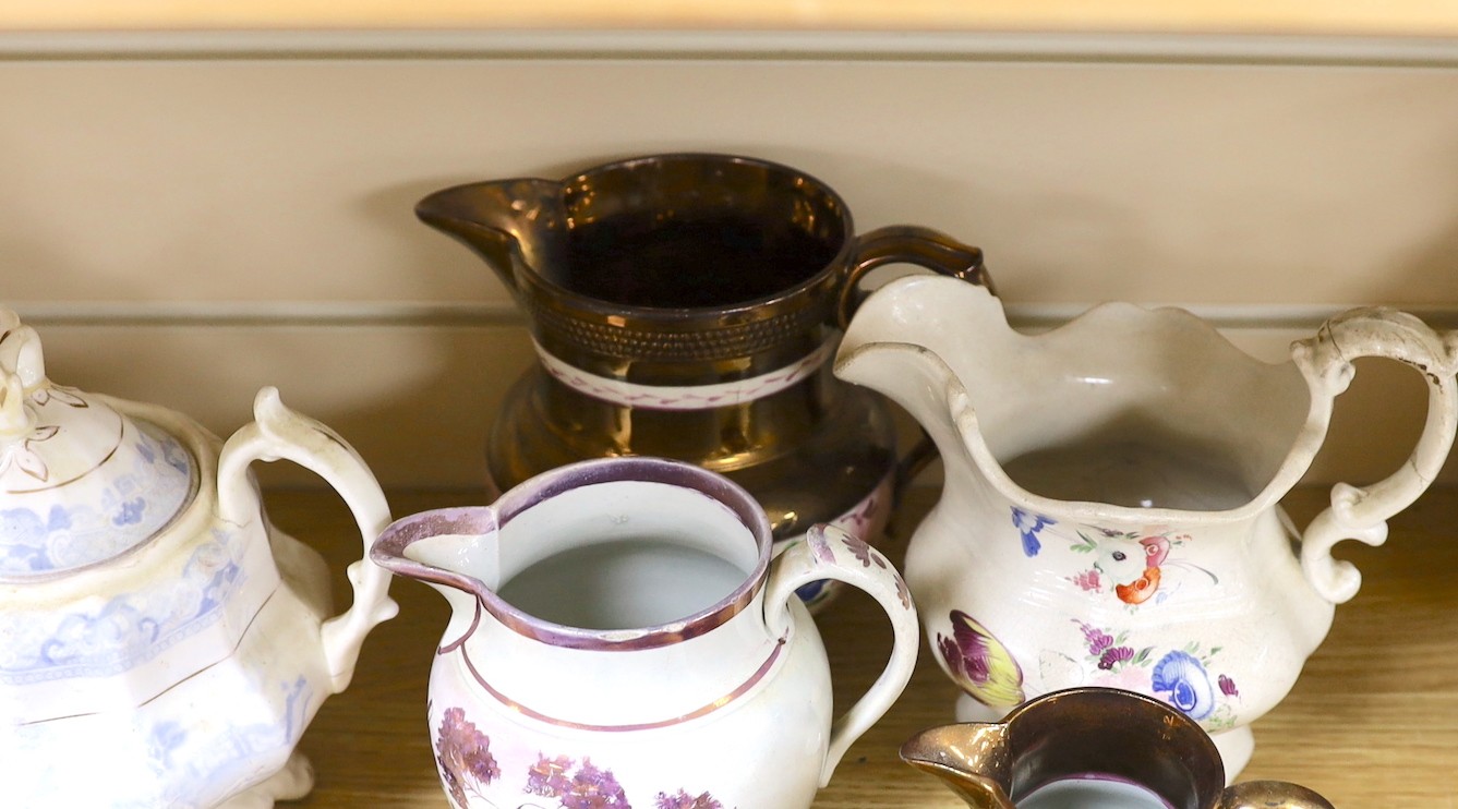 A collection of Victorian porcelain and pottery sucriers and jugs